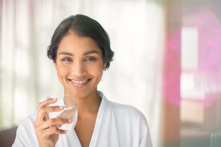 Pinckney Well Drilling & Geothermal | Coastal areas of SC and GA | smiling woman drinking water